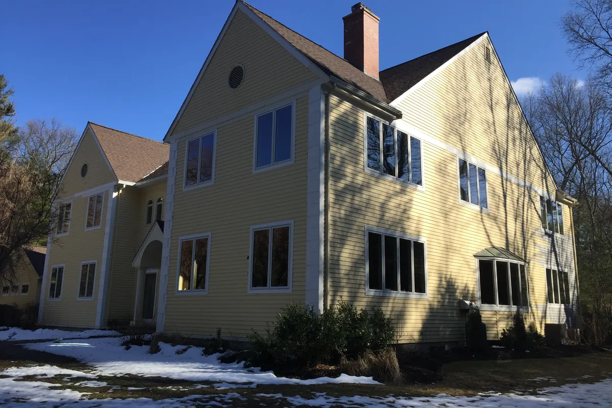 Completed replacement window project on a Dover home