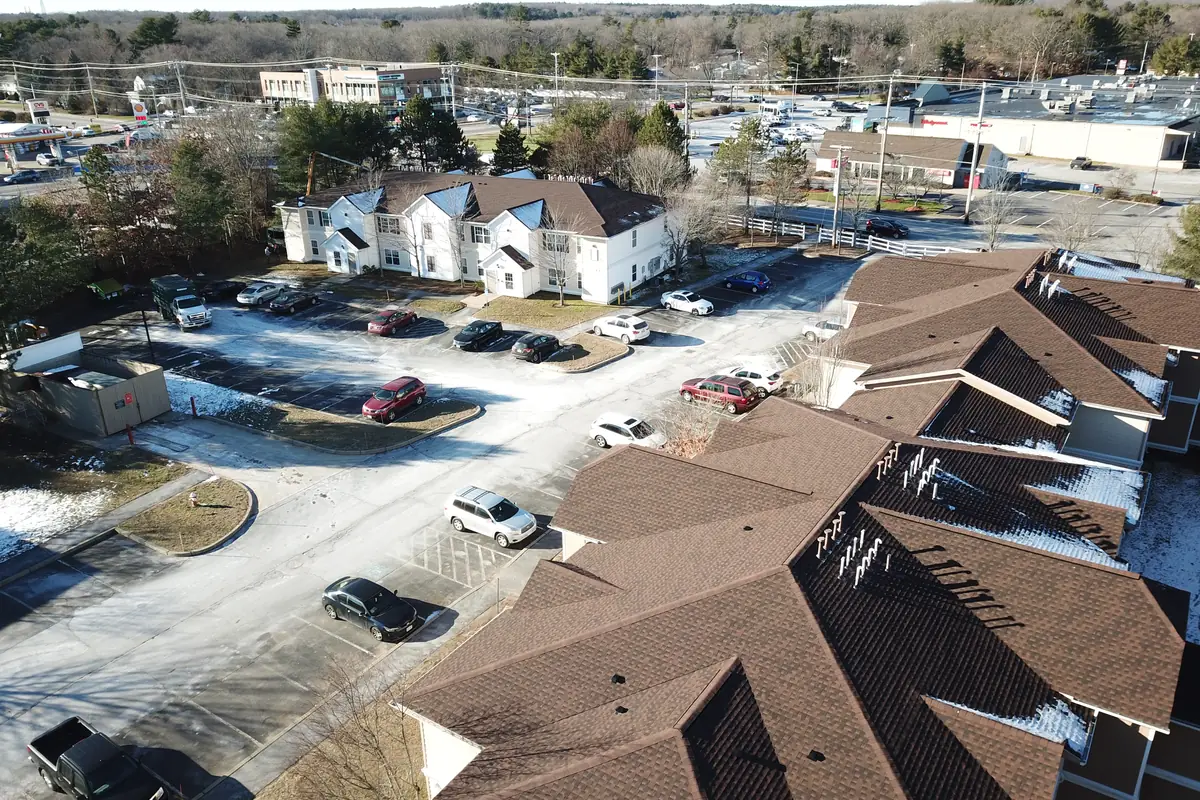 Aerial view of a large multi-unit roofing project completed by Mister Roof