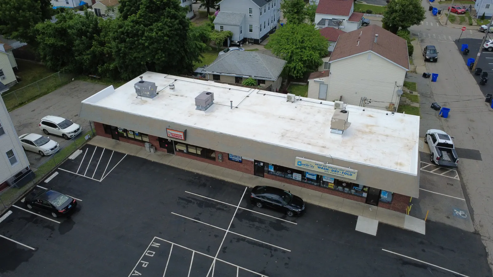 Completed white commercial flat roof system in Pawtucket