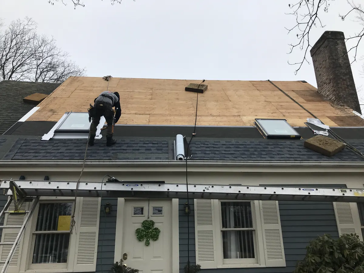 Multiple skylights installed and flashed on a residential roof